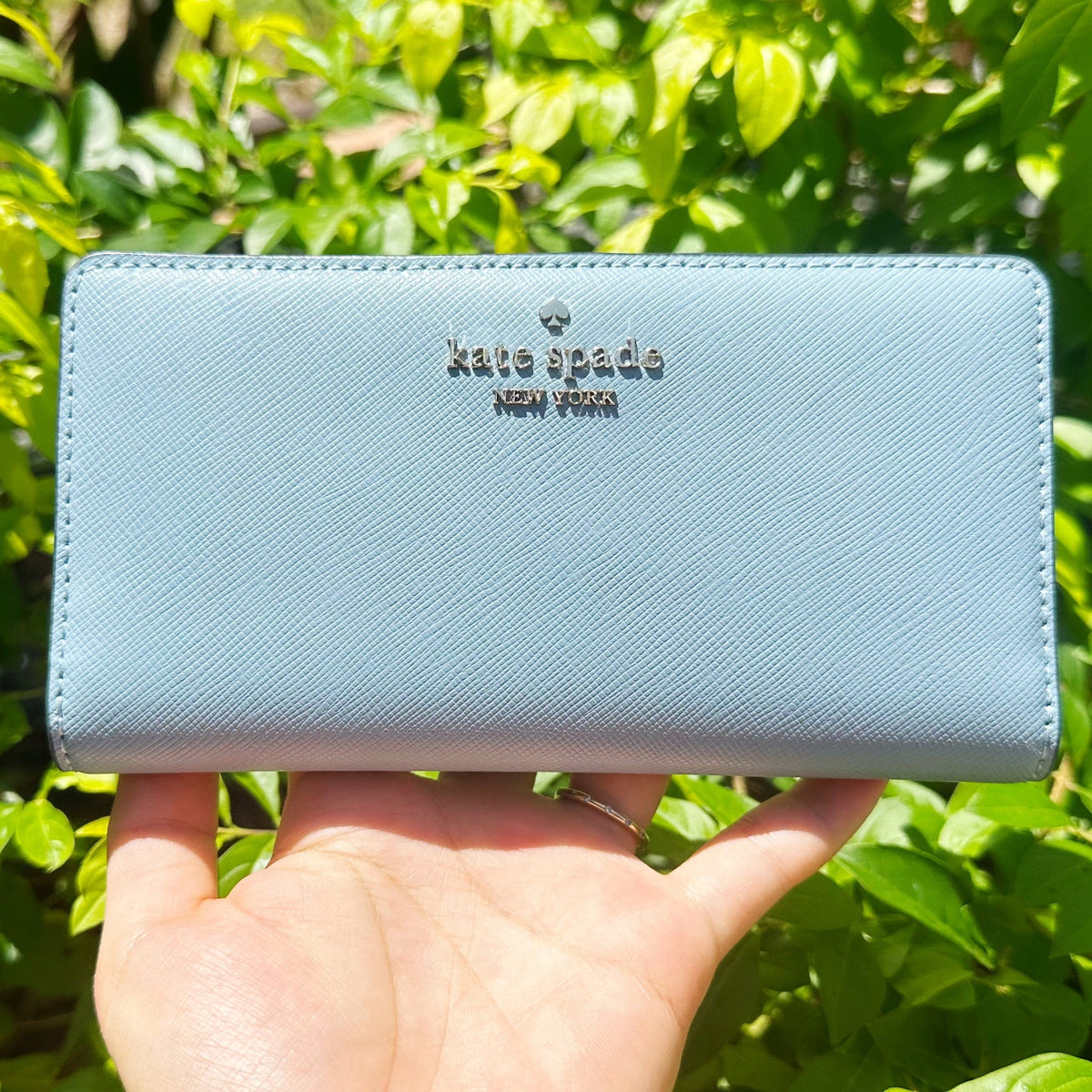 Kate Spade Madison Large Slim Bifold Wallet Polished Blue Saffiano Lea –  Gaby's Bags