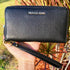 Michael Kors Jet Set Travel Large Phone Wristlet Wallet Pebbled Leather Black Michael Kors Wallets