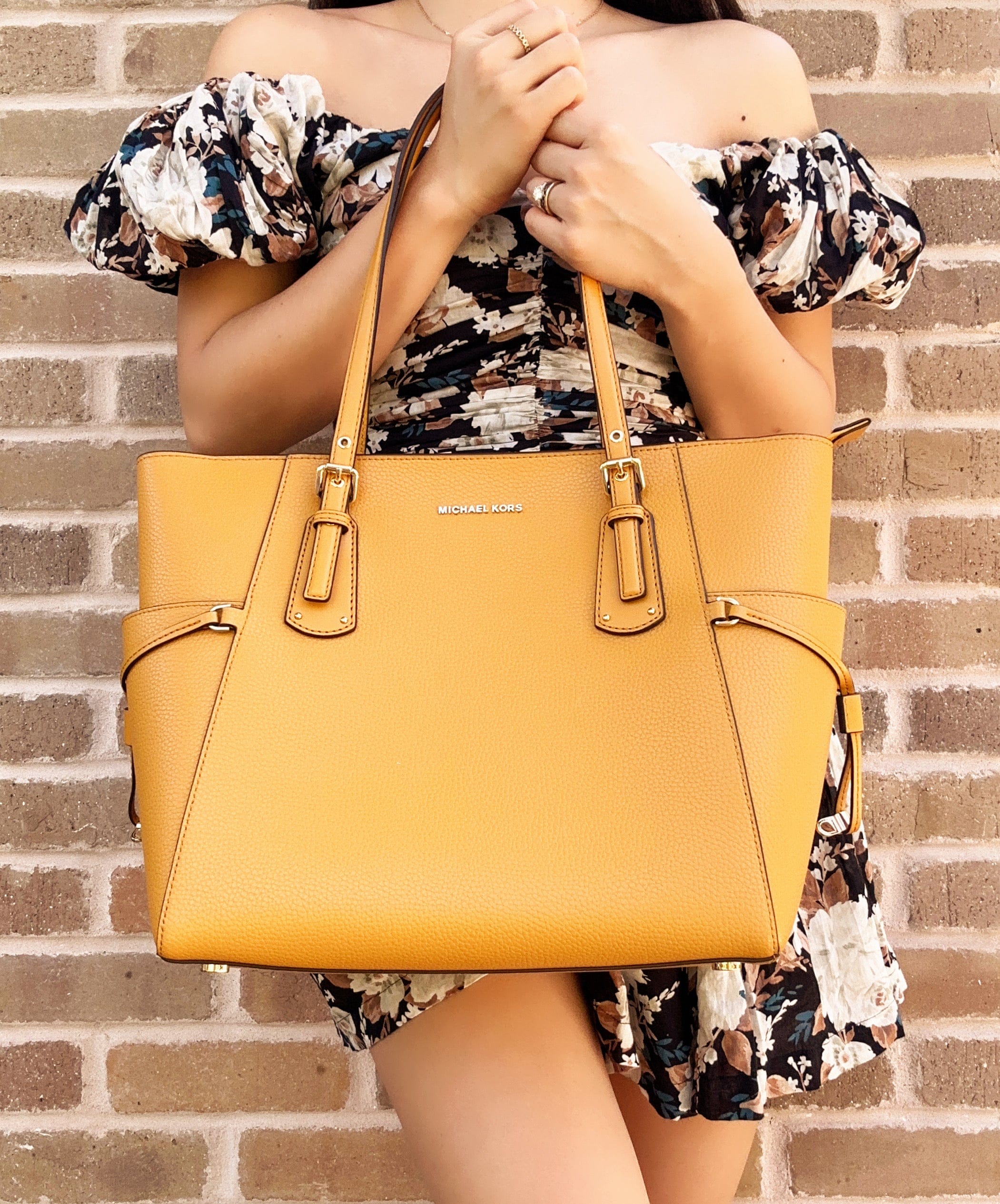 Designer leather bags: Michael Kors, Coach, Kate Spade and Tory